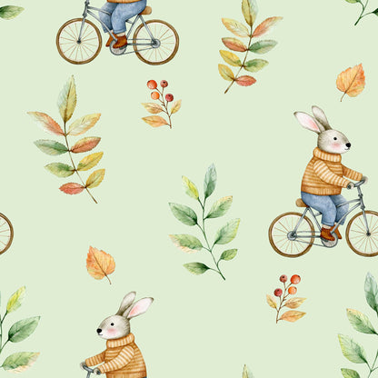 Vintage-inspired pale green childrens wallpaper featuring cute, adorable bunnies riding old-fashioned bikes